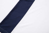 DAXUEN Oversized V-neck T-shirt with contrasting panels and graphics