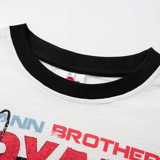 DAXUEN Graphic T-shirt with multi-panel design and relaxed fit