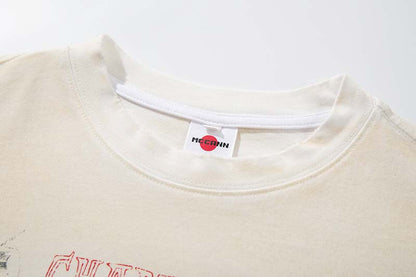 DAXUEN Vintage-washed graphic t-shirt with collage print