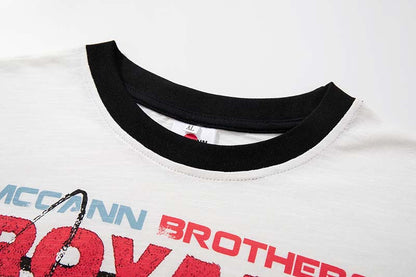 DAXUEN Graphic T-shirt with multi-panel design and relaxed fit