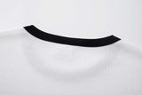 DAXUEN White waffle-knit graphic t-shirt with black and red print