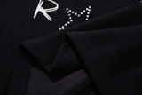 DAXUEN Black short-sleeved t-shirt with distressed graphic design