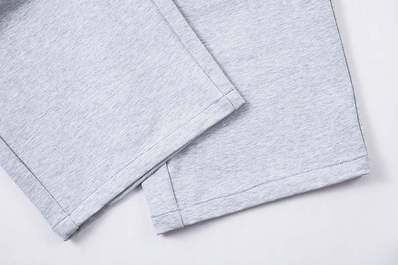 DAXUEN Grey wide-leg sweatpants with musical print and plaid details