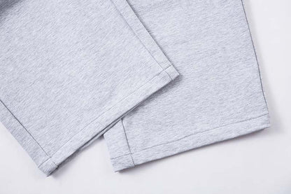DAXUEN Grey wide-leg sweatpants with musical print and plaid details