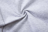 DAXUEN Grey wide-leg sweatpants with musical print and plaid details