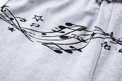 DAXUEN Grey wide-leg sweatpants with musical print and plaid details