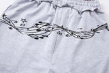 DAXUEN Grey wide-leg sweatpants with musical print and plaid details