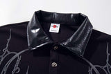 DAXUEN Black short-sleeved polo shirt with graphic print