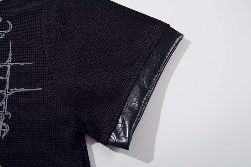 DAXUEN Black short-sleeved polo shirt with graphic print