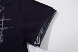 DAXUEN Black short-sleeved polo shirt with graphic print