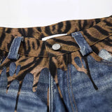 DAXUEN Distressed wide-leg jeans with tiger stripe pattern