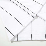 DAXUEN White short-sleeved polo shirt with pinstripes and graphics