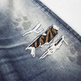 DAXUEN Distressed wide-leg jeans with tiger stripe pattern