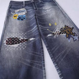 DAXUEN Baggy blue denim jeans with graphic patches