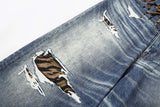 DAXUEN Distressed wide-leg jeans with tiger stripe pattern