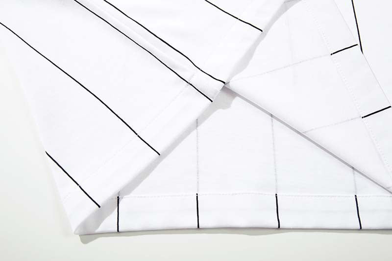 DAXUEN White short-sleeved polo shirt with pinstripes and graphics