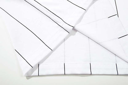 DAXUEN White short-sleeved polo shirt with pinstripes and graphics