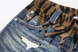 DAXUEN Distressed wide-leg jeans with tiger stripe pattern