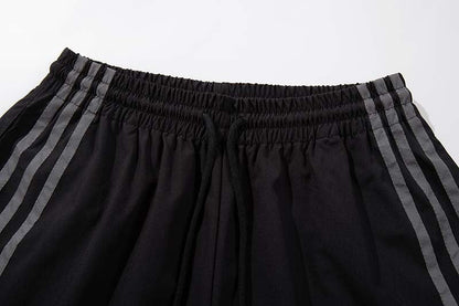 DAXUEN Wide-leg track pants in solid colors