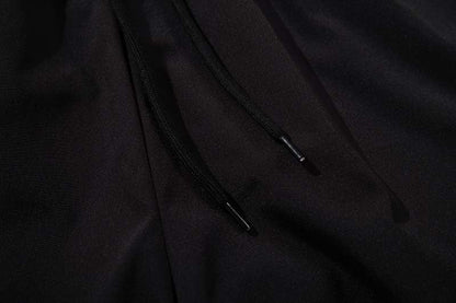 DAXUEN Wide-leg track pants in solid colors