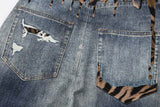 DAXUEN Distressed wide-leg jeans with tiger stripe pattern