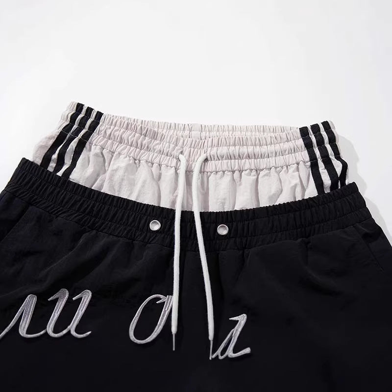 DAXUEN Color-blocked wide-leg track pants