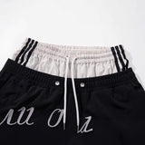DAXUEN Color-blocked wide-leg track pants
