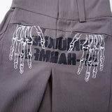 DAXUEN Dark grey women's flared pants with graphic details