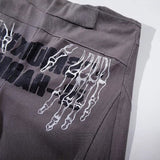 DAXUEN Dark grey women's flared pants with graphic details