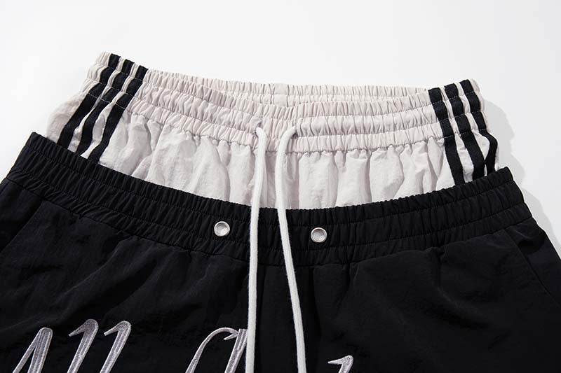 DAXUEN Color-blocked wide-leg track pants