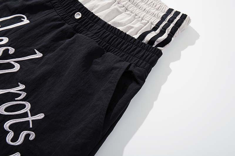 DAXUEN Color-blocked wide-leg track pants
