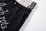 DAXUEN Color-blocked wide-leg track pants
