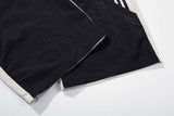 DAXUEN Color-blocked wide-leg track pants