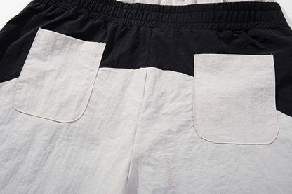 DAXUEN Color-blocked wide-leg track pants