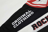 DAXUEN Black and white graphic V-neck t-shirt with red accents