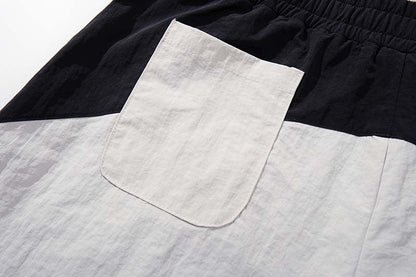 DAXUEN Color-blocked wide-leg track pants