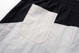 DAXUEN Color-blocked wide-leg track pants
