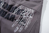 DAXUEN Dark grey women's flared pants with graphic details