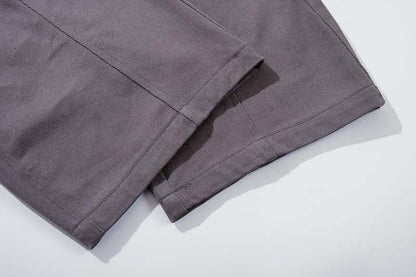 DAXUEN Dark grey women's flared pants with graphic details