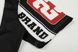 DAXUEN Black and white graphic V-neck t-shirt with red accents