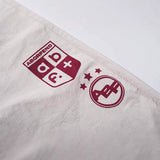 DAXUEN Wide-leg pants with red cross graphic and adjustable drawstrings