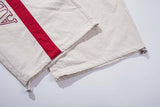 DAXUEN Wide-leg pants with red cross graphic and adjustable drawstrings