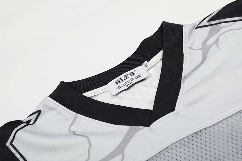 DAXUEN Distressed V-neck short sleeve top with graphic print
