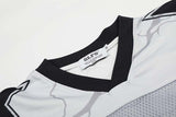 DAXUEN Distressed V-neck short sleeve top with graphic print