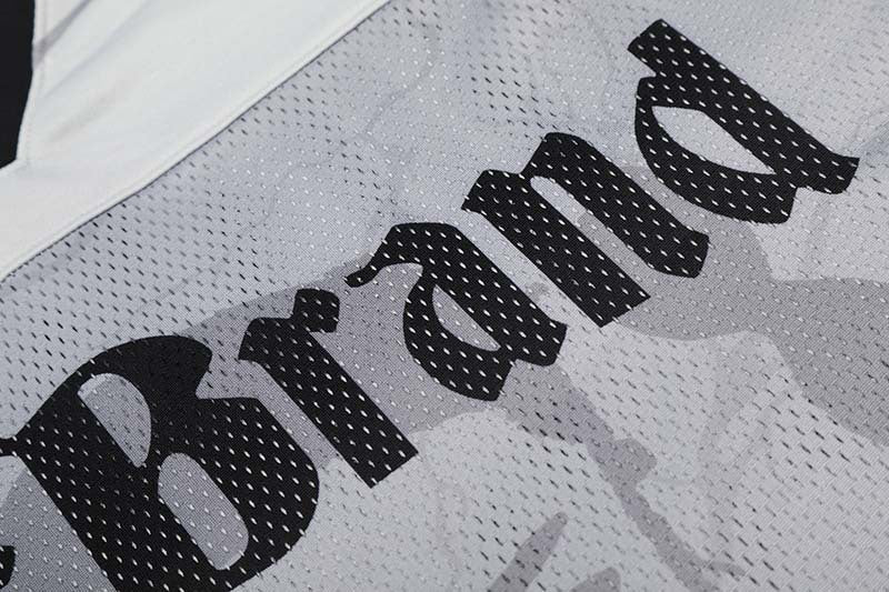 DAXUEN Distressed V-neck short sleeve top with graphic print