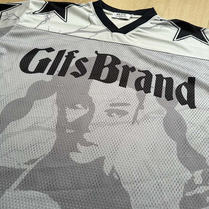 DAXUEN Distressed V-neck short sleeve top with graphic print
