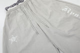 DAXUEN Gothic graphic wide-leg pants with multi-layered waistband