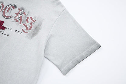 DAXUEN Distressed oversized short-sleeved t-shirt with graphics