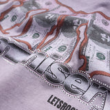 DAXUEN Washed oversized graphic t-shirt with dollar bills and 'misery' print