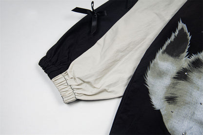 DAXUEN Black oversized pullover with kitten graphic and studs